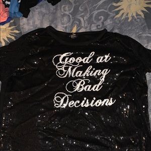 Black glittery crop top.